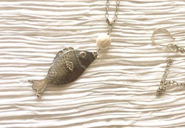Hand carved fish necklace, long, in sterling