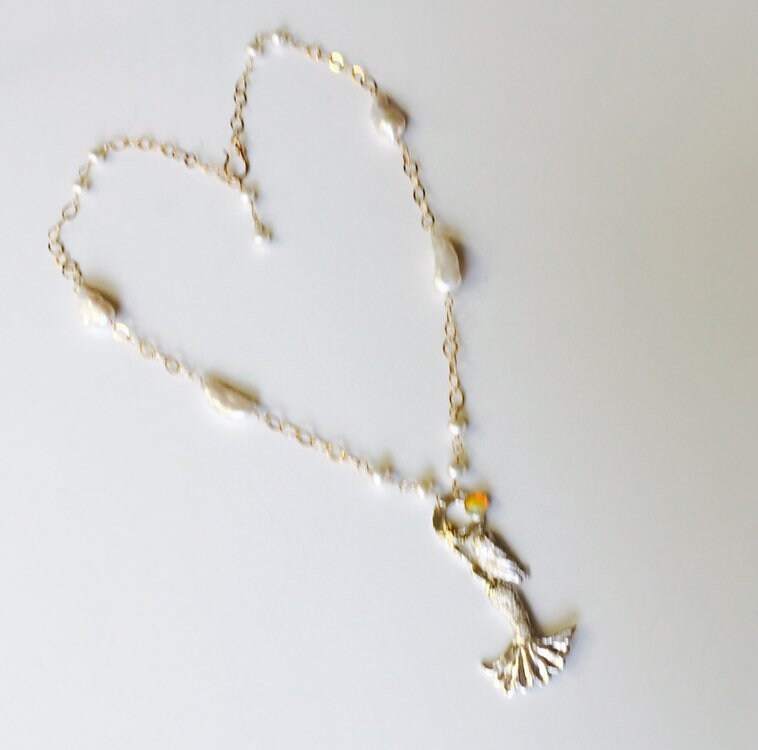 Reaching for the sun. Fine silver, pearl, opal and 14Ktgf long adjustable necklace.