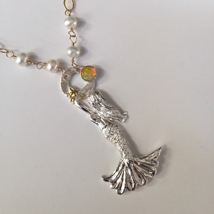 Reaching for the sun. Fine silver, pearl, opal and 14Ktgf long adjustable necklace.